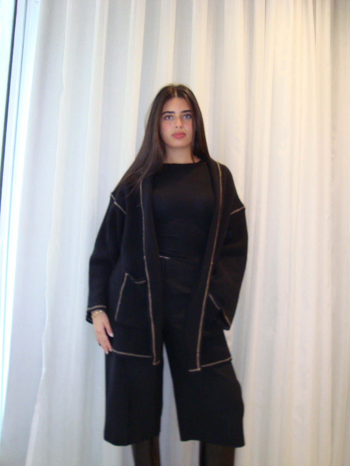 THE KNITTED EDGED CARDIGAN IN BLACK